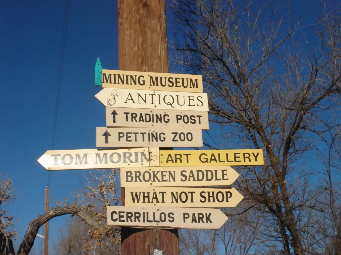 Cerrillos, or something calling itself Cerrillos: the signpost, and the Clear Light Opera House.