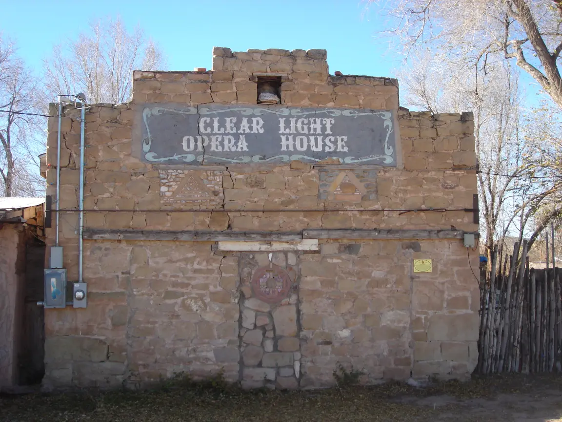 Cerrillos, or something calling itself Cerrillos: the signpost, and the Clear Light Opera House.