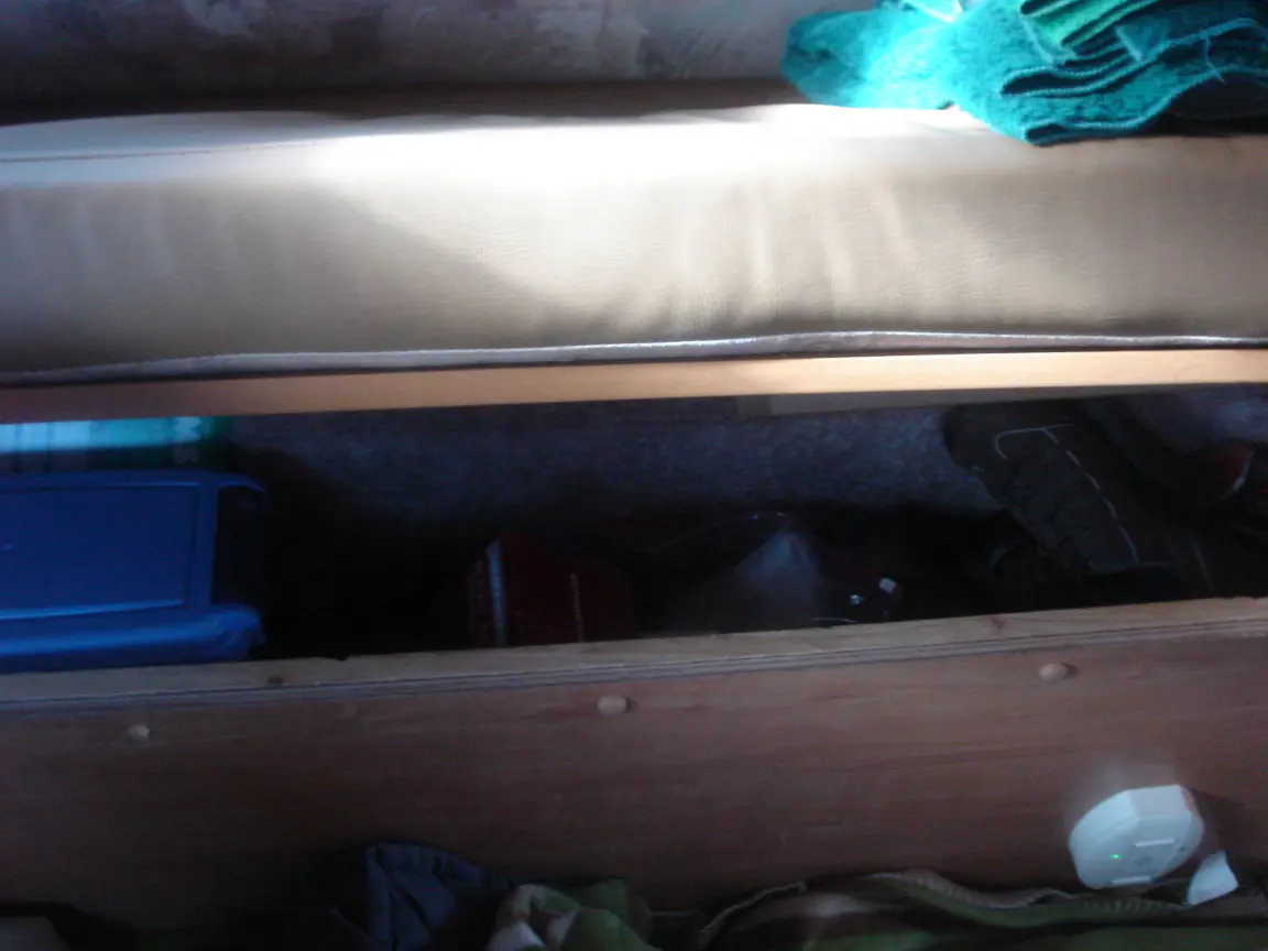 The van the day we brought it back: Simon's spot between the seats, the galley, the drawers, and every cabinet we learned to latch.